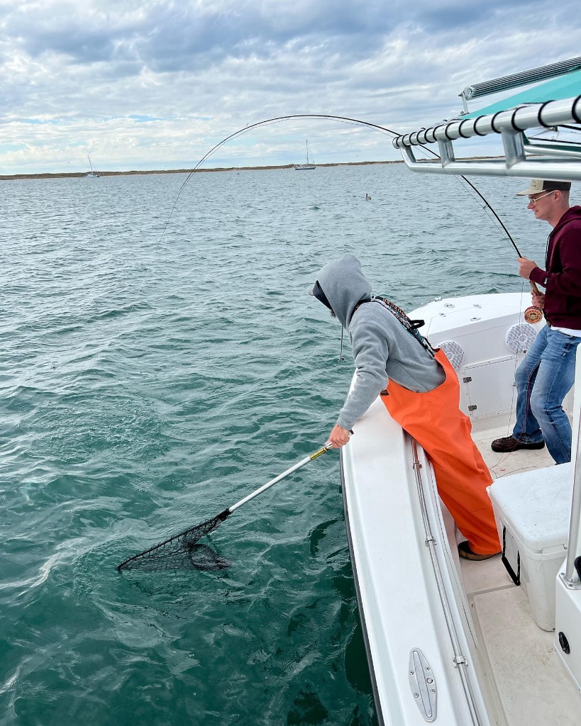 Angler holding fishing rod in Morehead City