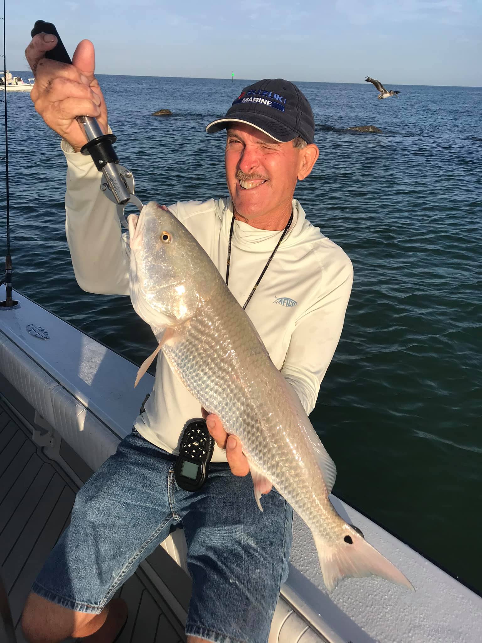 Lone angler fishing in Naples