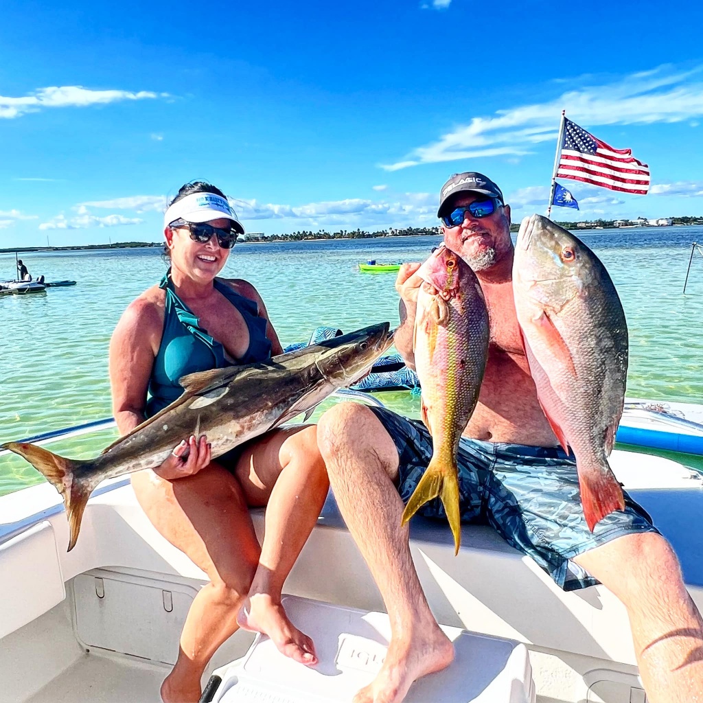 3 big fish caught by a person fishing in Tavernier