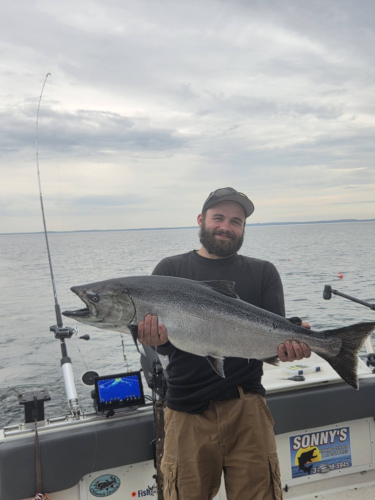 Large Chinook salmon caught fishing at Sodus Point NY displayed on boat