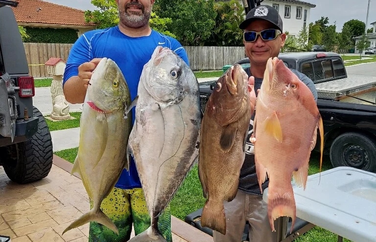 4 big fish caught during a fishing tour in Coral Gables