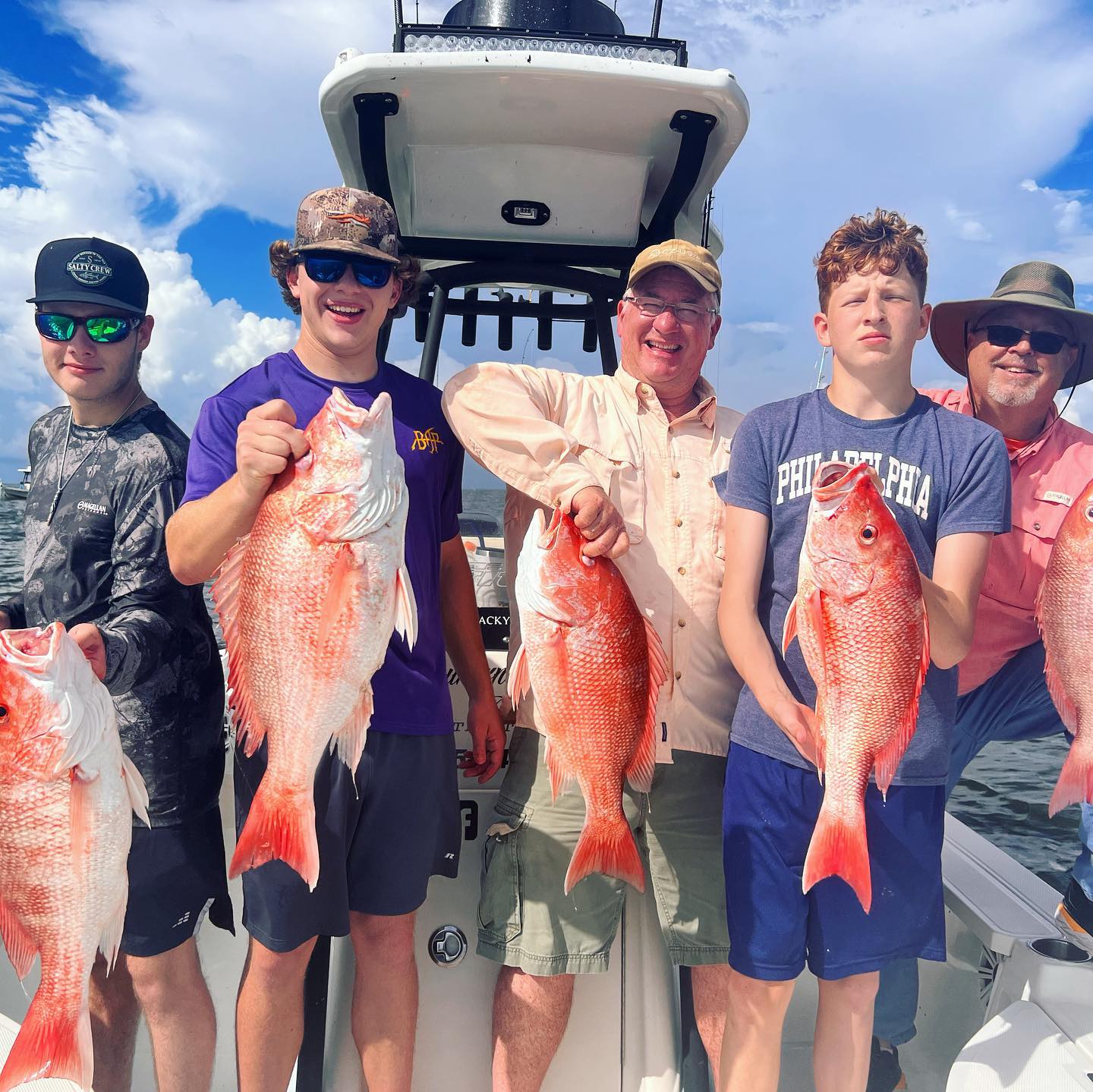 5 grey snapper fish caught while fishing in LA