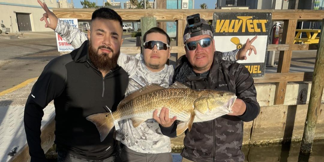 Lower Laguna Madre afternoon inshore fishing charter boat targeting redfish and trout