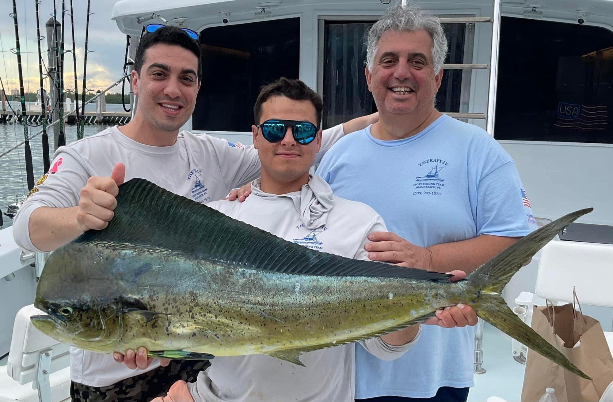 A group of 3 people fishing in Florida