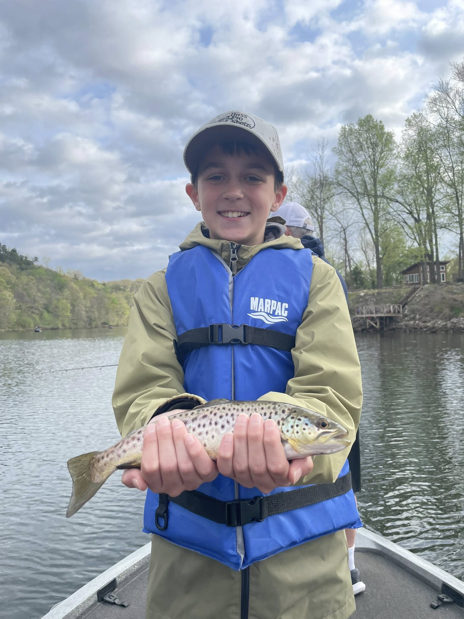 Brown trout catch displayed on fishing boat in Branson Missouri
