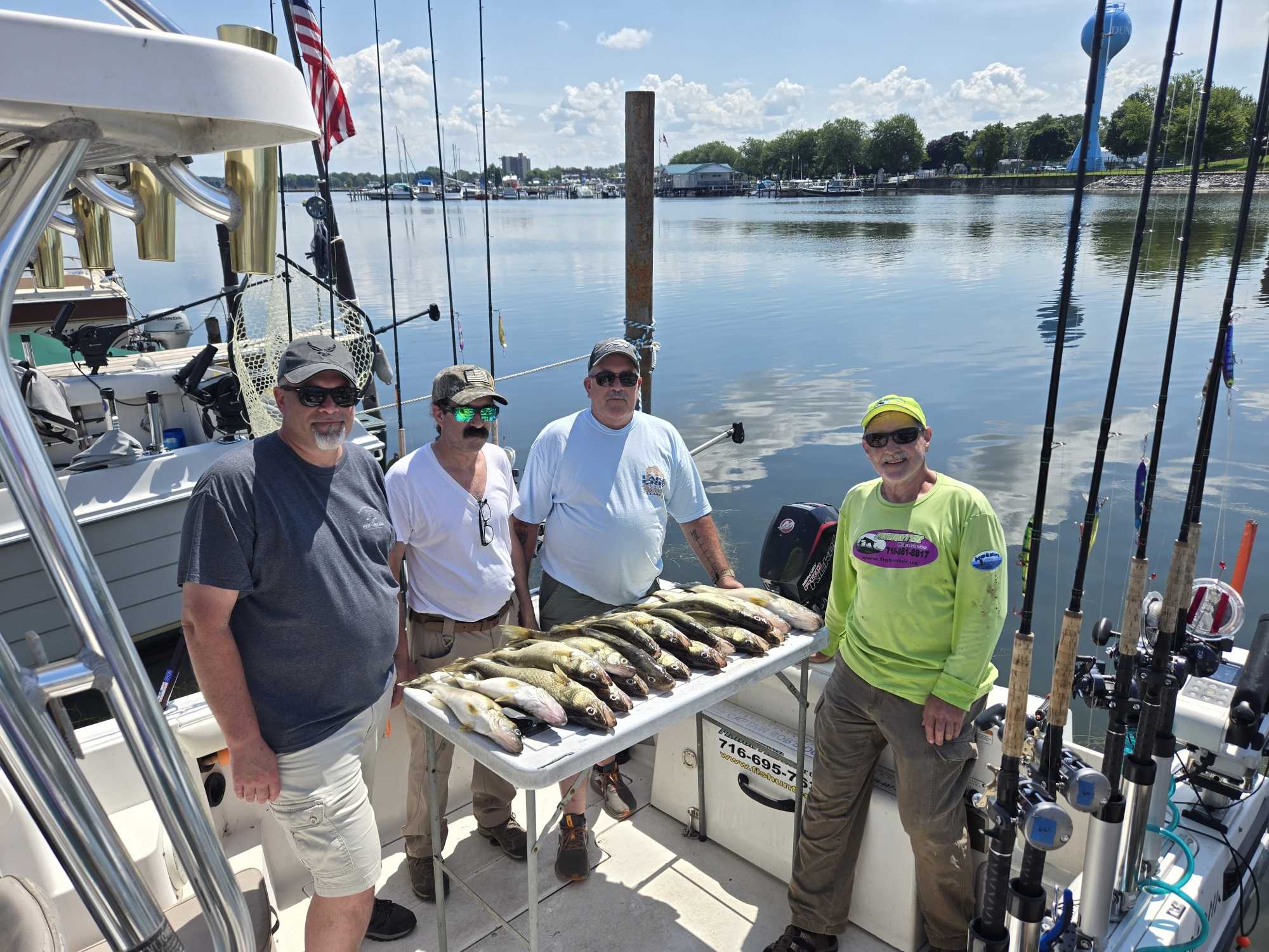 Successful fishing trip with multiple fish displayed on cleaning table at Dunkirk NY marina