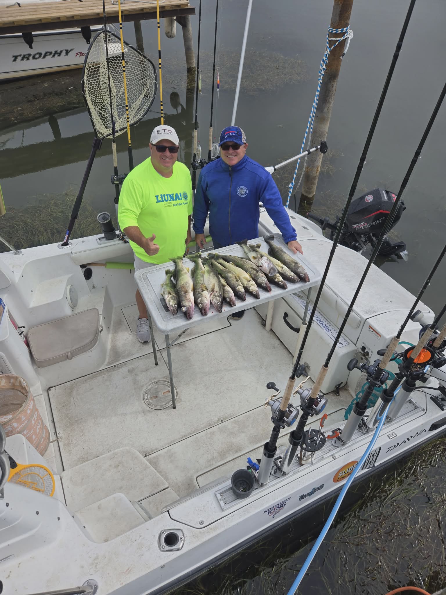 Successful fishing trip in Dunkirk NY with fresh catch displayed on boat