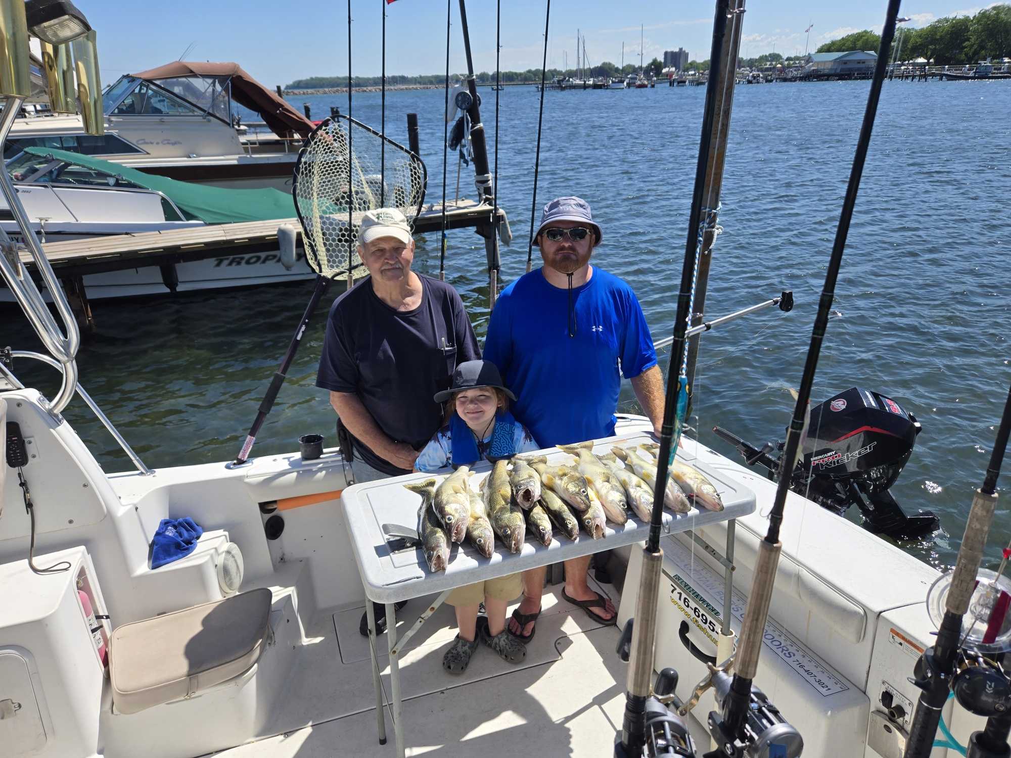 Successful fishing trip on Lake Erie near Dunkirk NY with large catch of fish displayed on boat