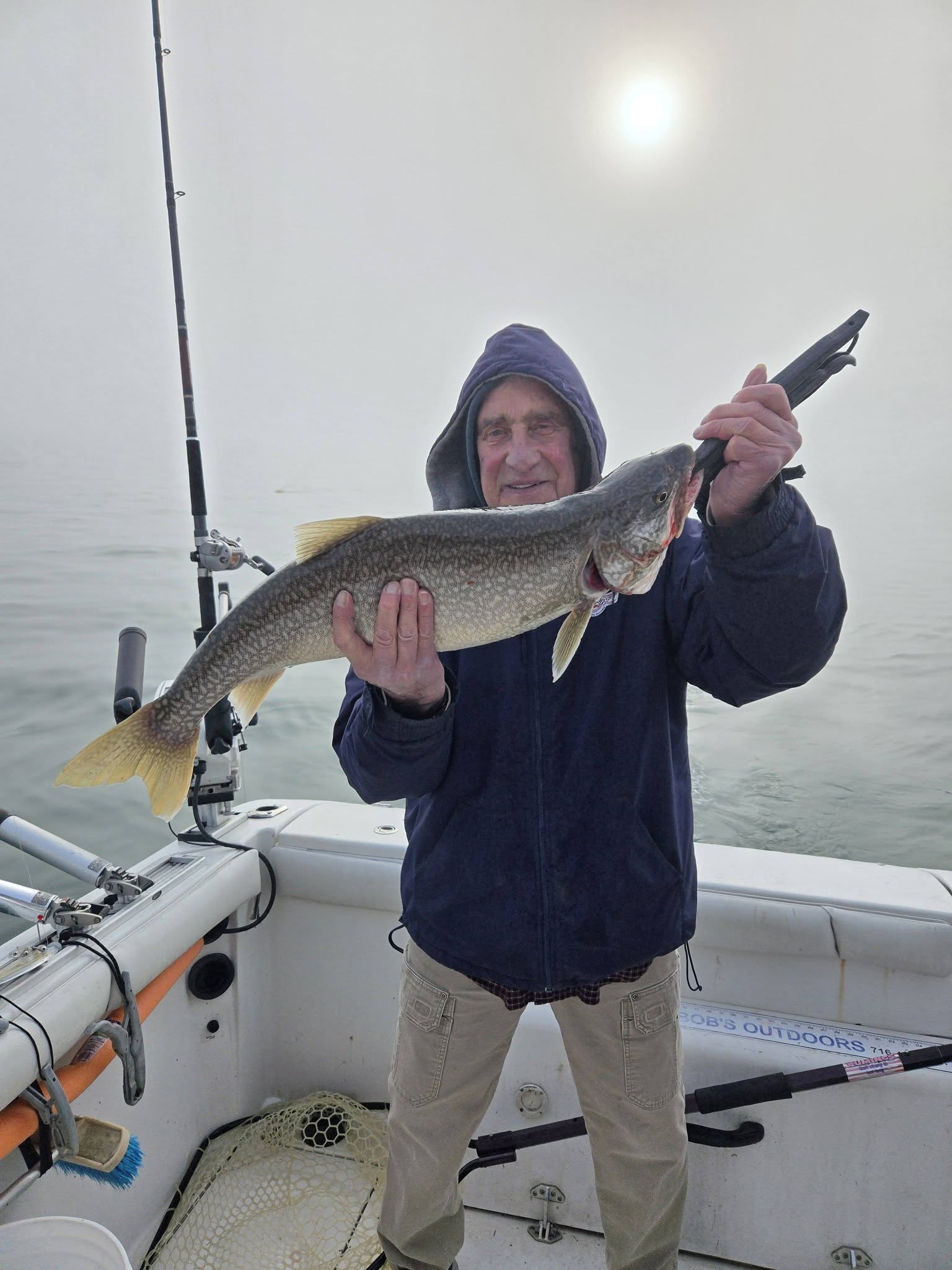Lake trout caught fishing in Dunkirk NY displayed on boat deck