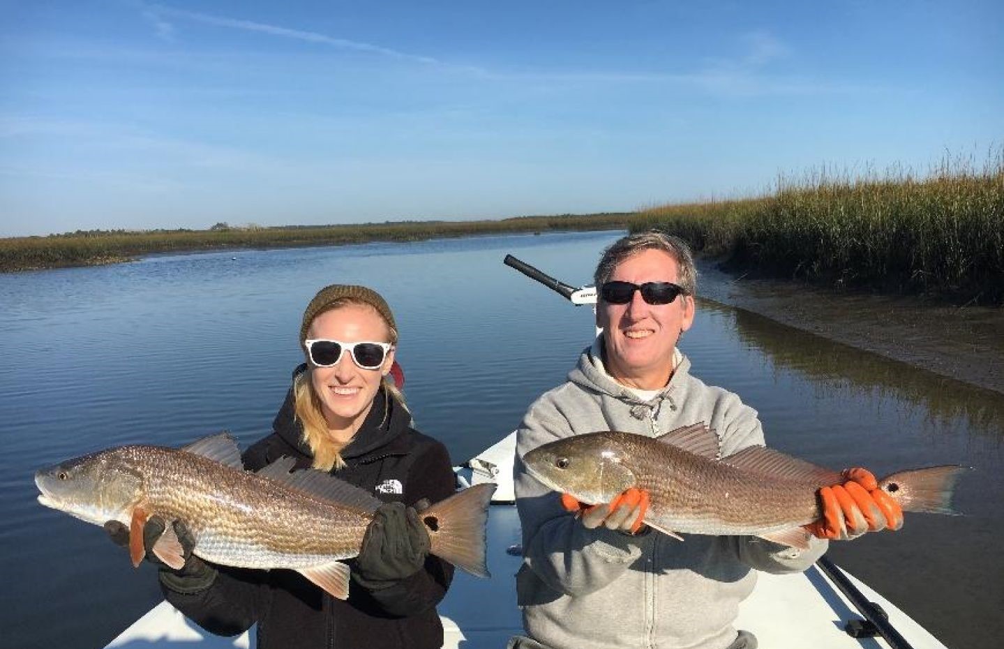 Two redfish, 19 inches long, caught fishing in FL