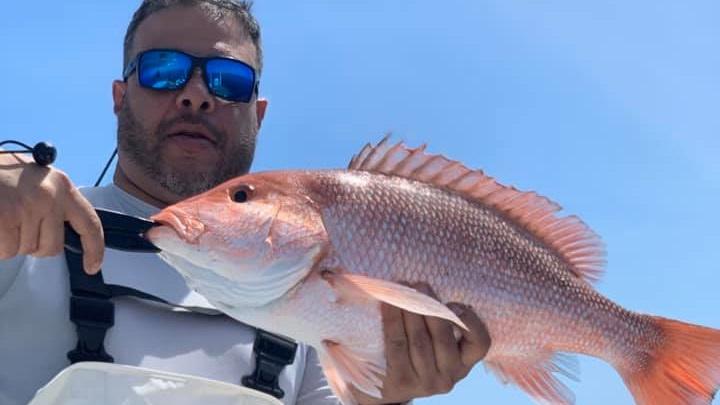 One angler posing with big fish in Tampa