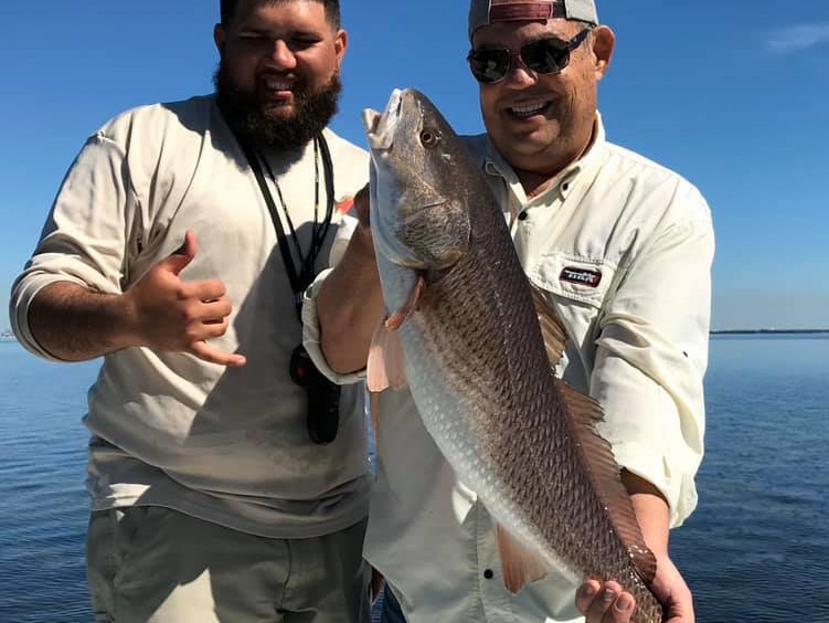 Two people fishing in Tampa
