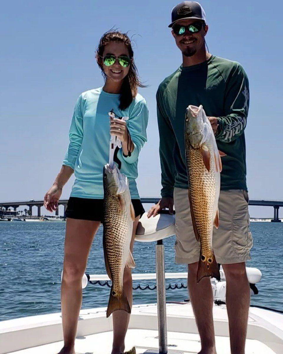 Two redfish caught during fishing trip in Gulf Shores Alabama