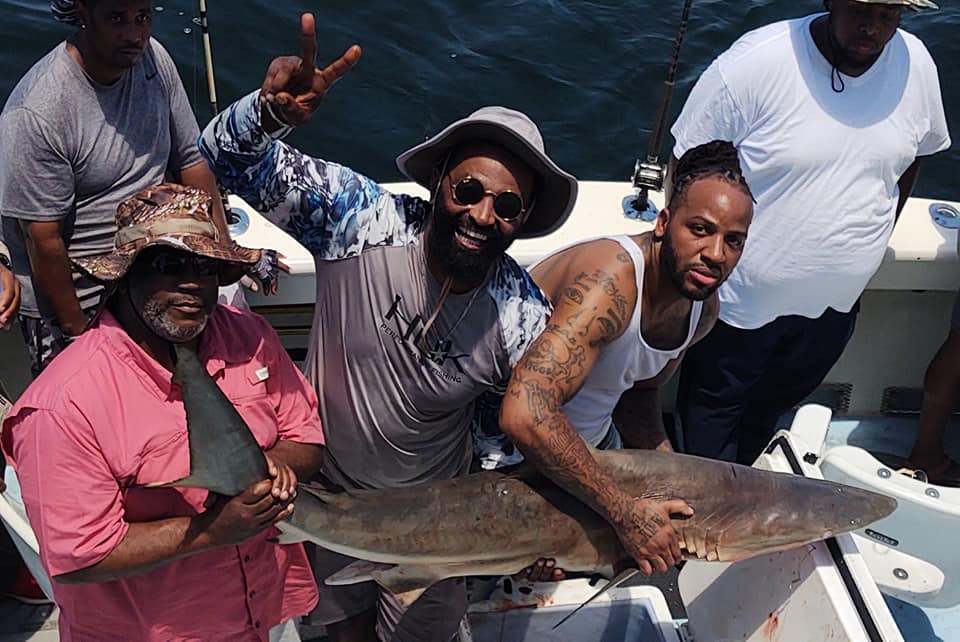 Group of 6 people fishing in Biloxi