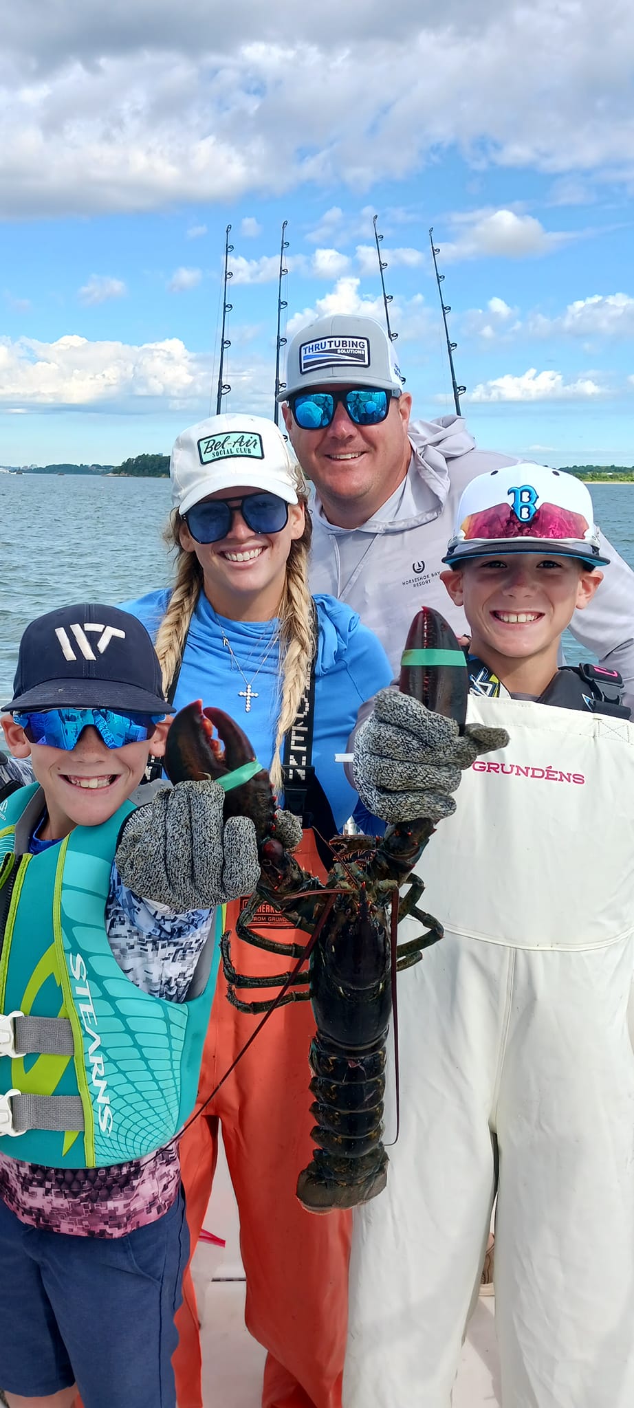 4 people enjoying a day of fishing in MA