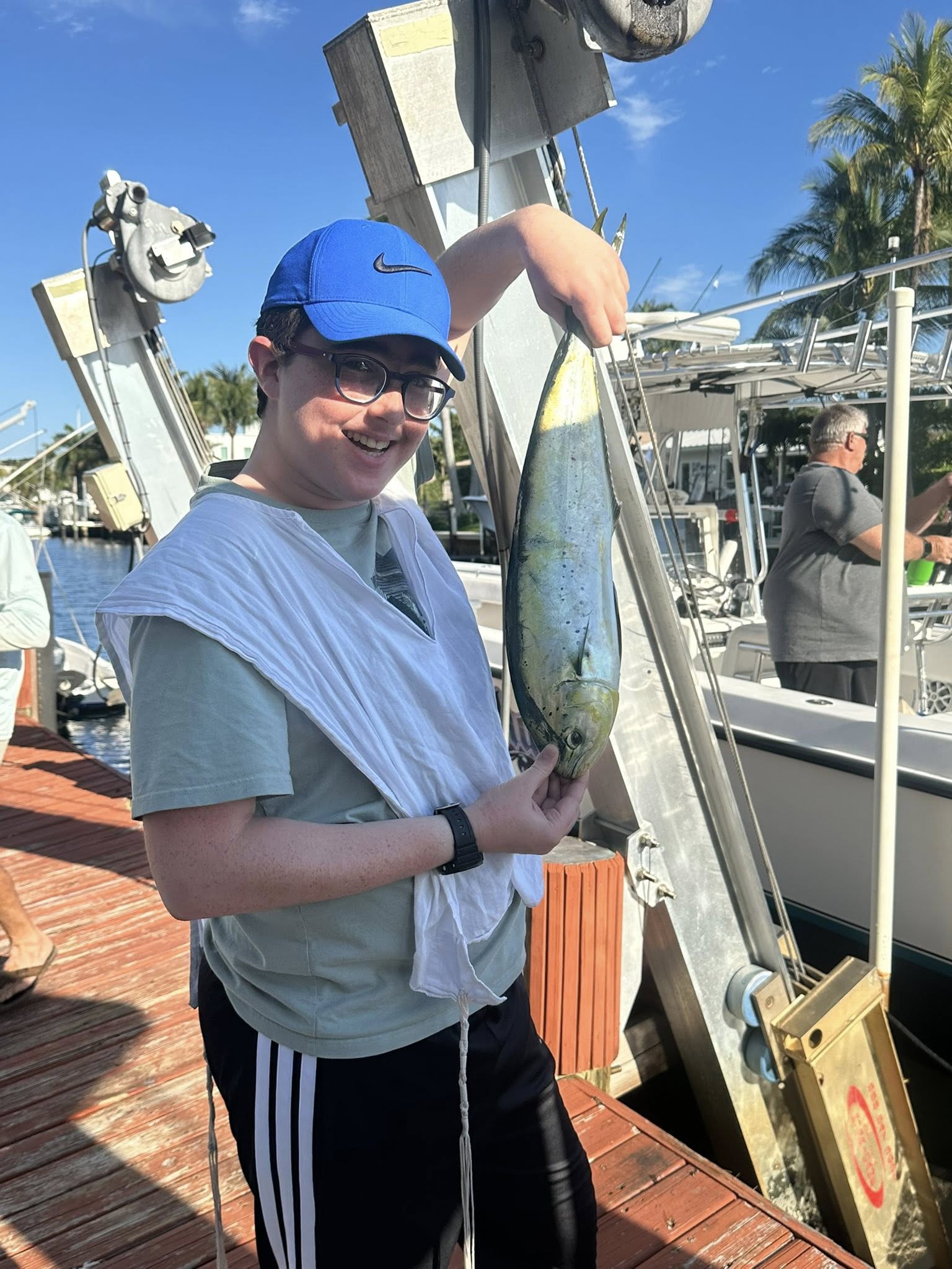 Mahi mahi catch displayed on fishing charter boat dock in Pompano Beach FL