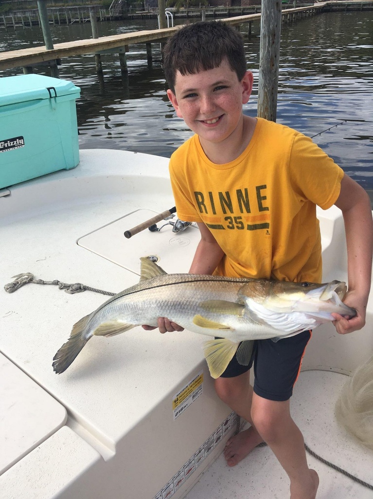 Angler holding a 20-inch fish in FL