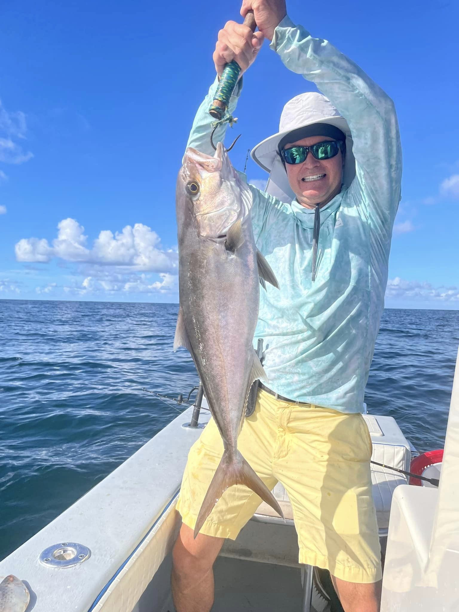 A lone fisherman in Gulf Breeze, Florida, enjoying a successful fishing trip