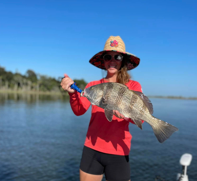 Angler with a big black drum fish at Jacksonville Beach