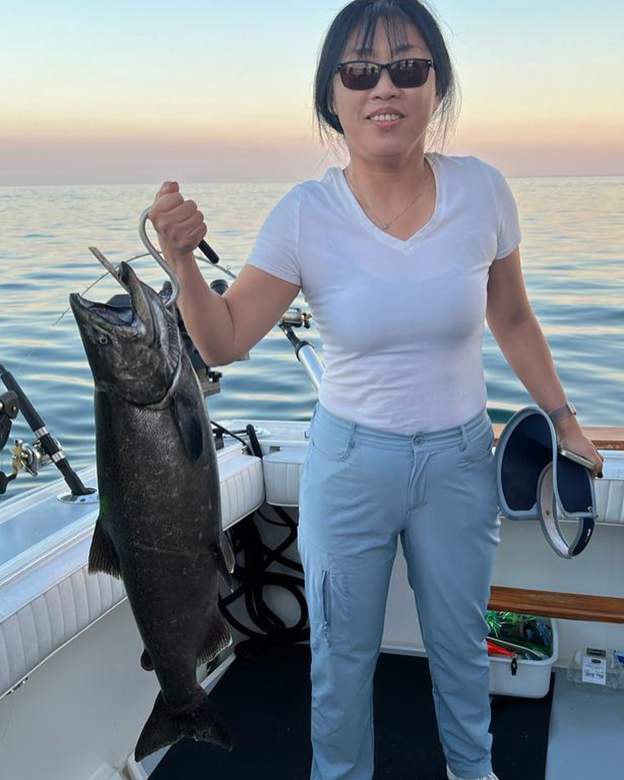 Coho salmon being caught while fishing in ON