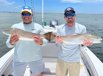 Two people fishing on a holiday trip