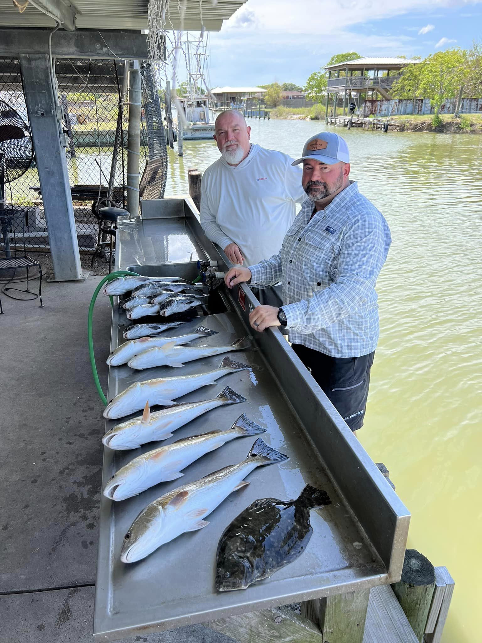 Two anglers with a catch of big fish in Texas City
