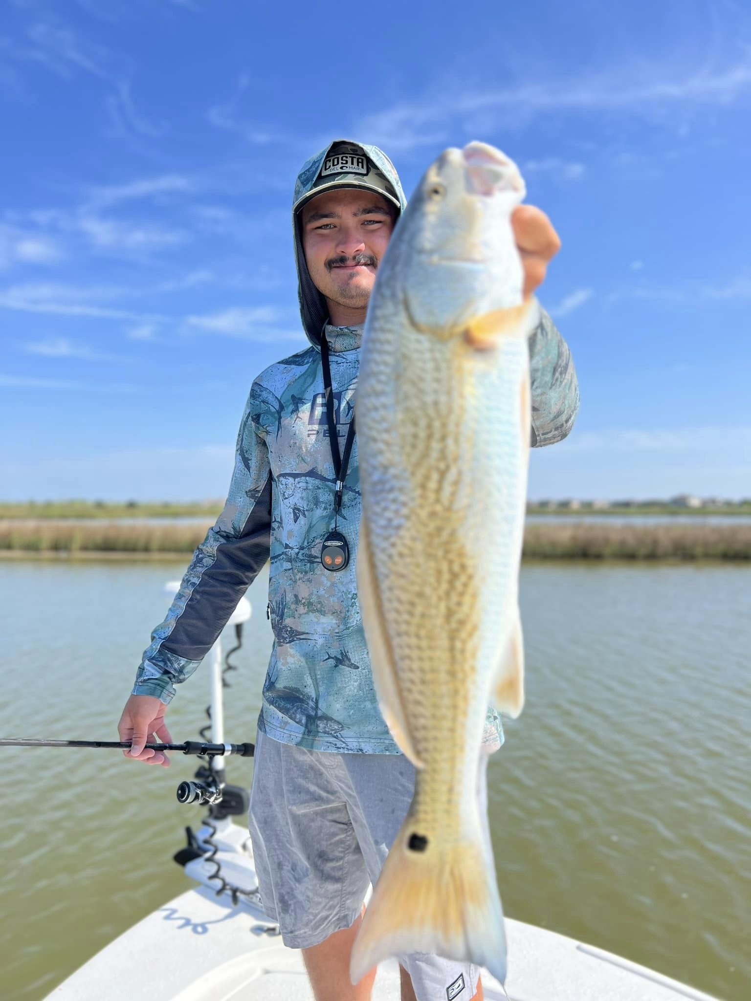 A person fishing in Texas City