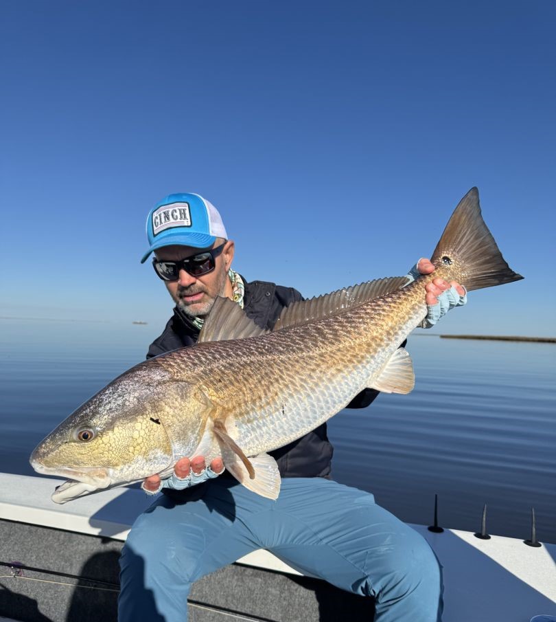 Angler with a big fish in Port Sulphur