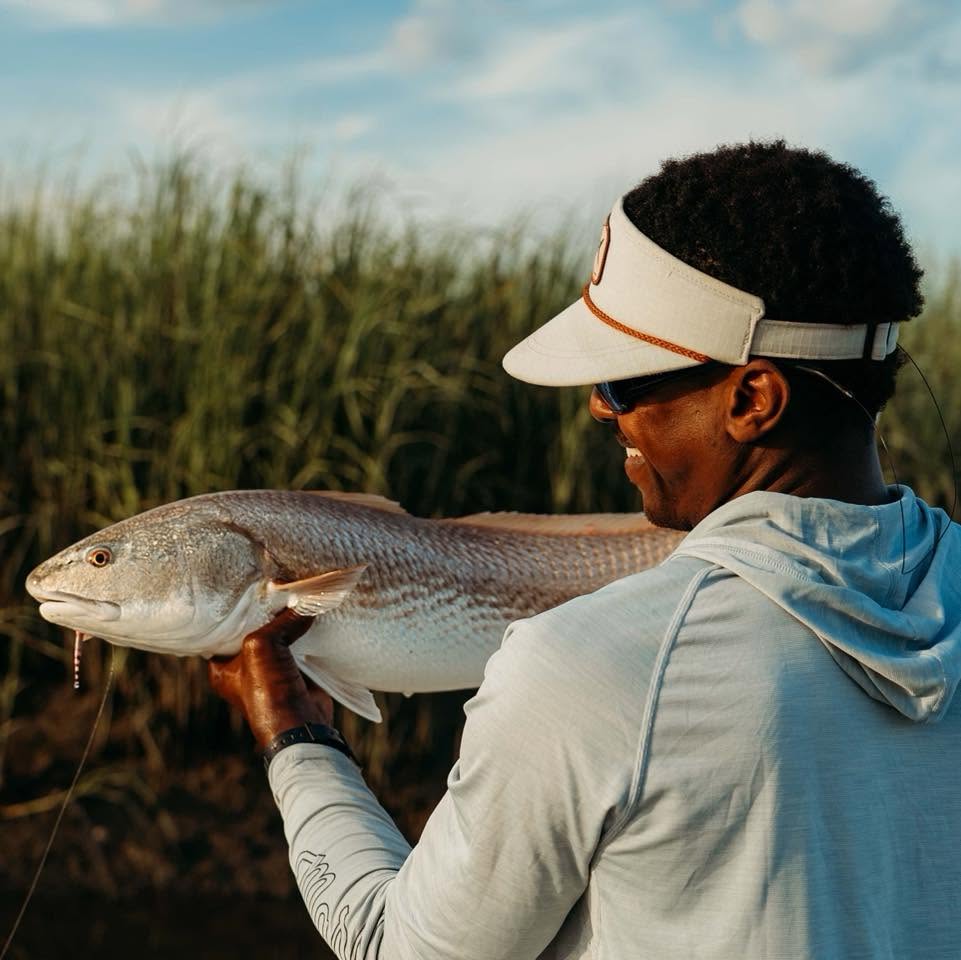Redfish catch held up during fishing trip on Johns Island SC