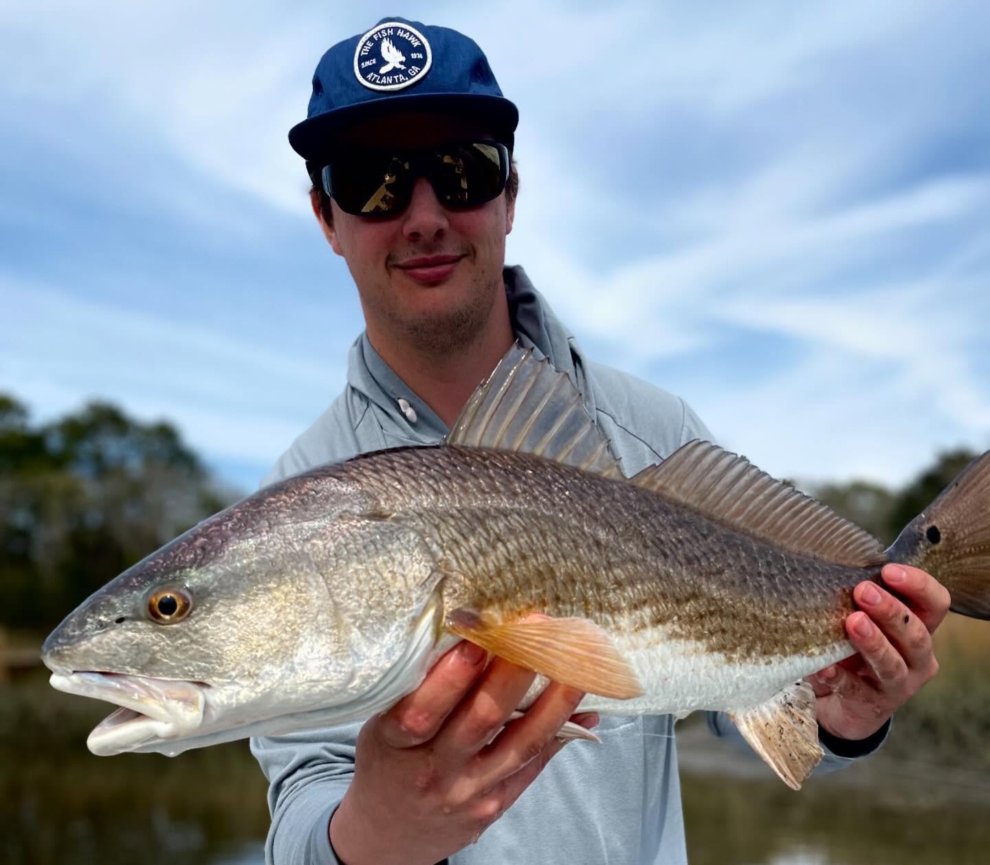 Charleston inshore fishing charter boat in scenic Lowcountry marshes and creeks with Captain Austin