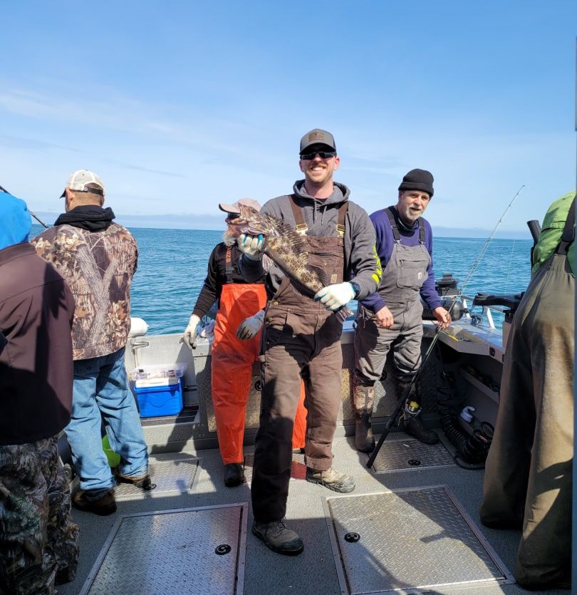 Couple fishing in Garibaldi with a 13-inch fish