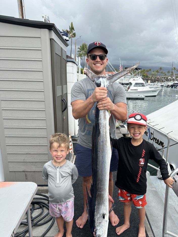 FIRE HATT sportfishing boat in Kona waters targeting marlin, tuna, mahi mahi with Captain Chuck