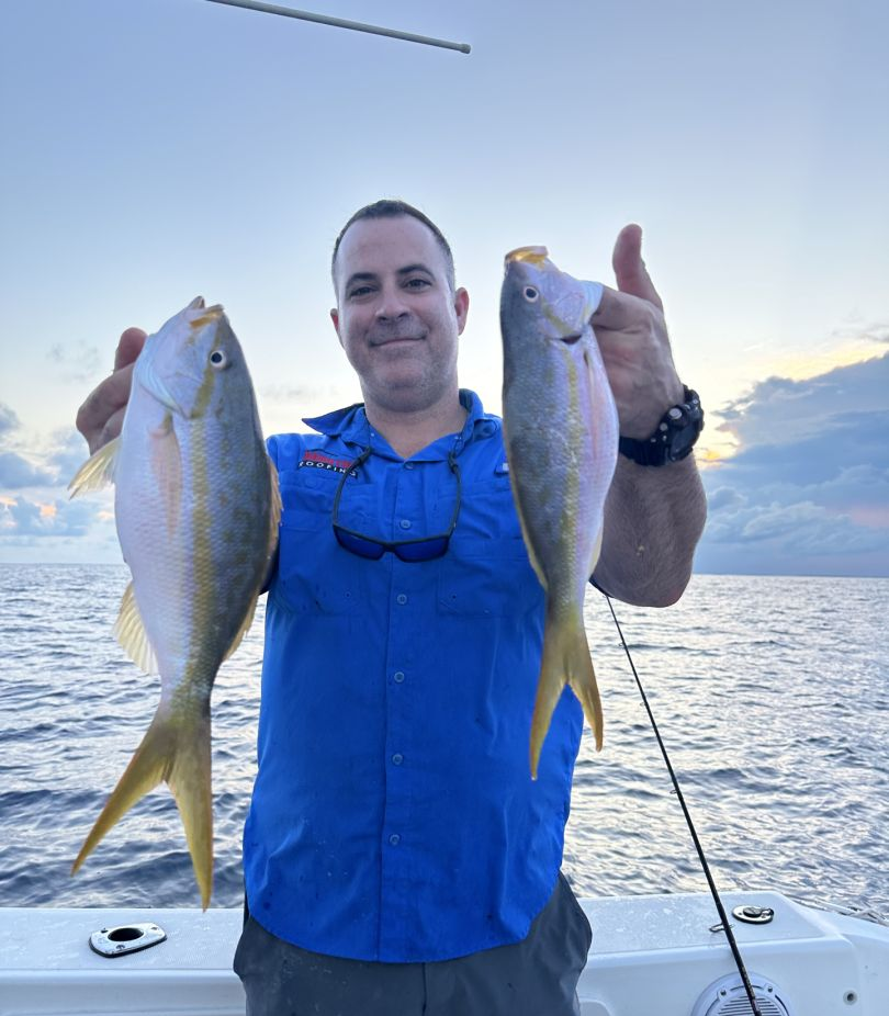 Two big fish caught during a cruises, fishing, and water sports adventure in Homestead