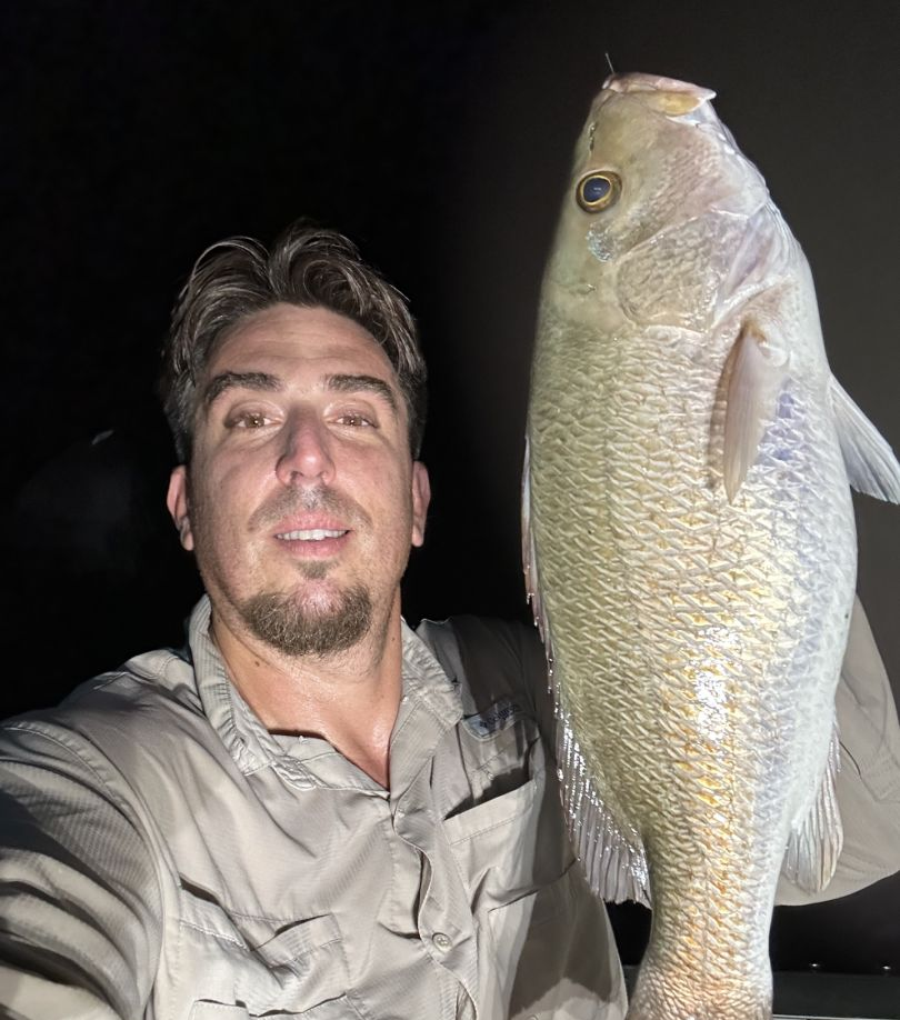 A person enjoying a fishing cruise in FL