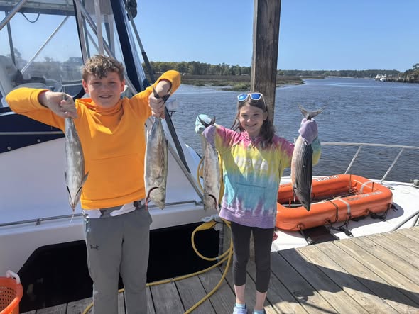 Successful fishing trip in Calabash NC with multiple fish species caught from charter boat
