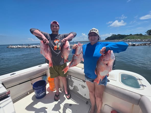 Red snapper fishing catch displayed on boat in Gulf Shores AL