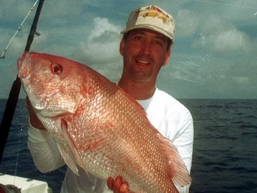 Deep drop fishing charter boat heading offshore Florida waters targeting grouper and tilefish