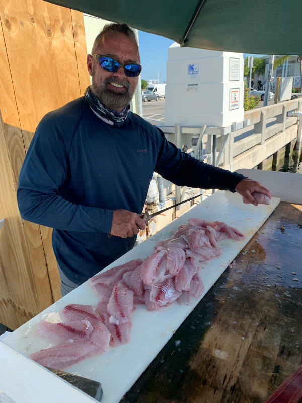 A person fishing in Key West