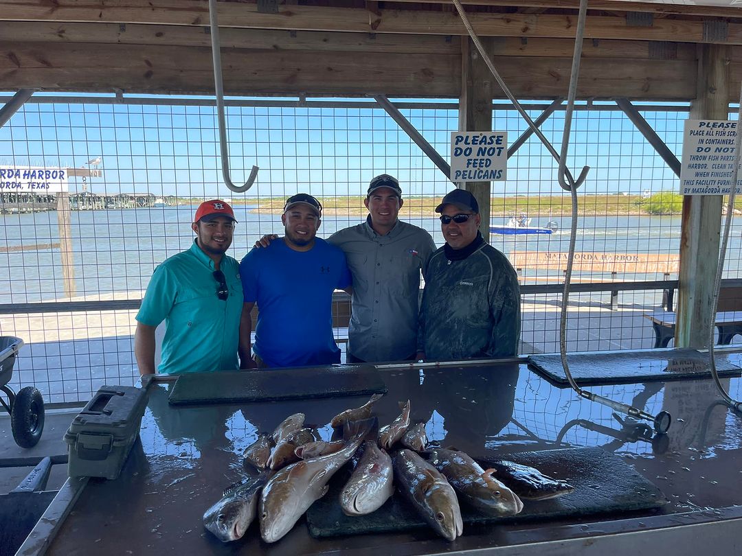 Four people fishing in Palacios