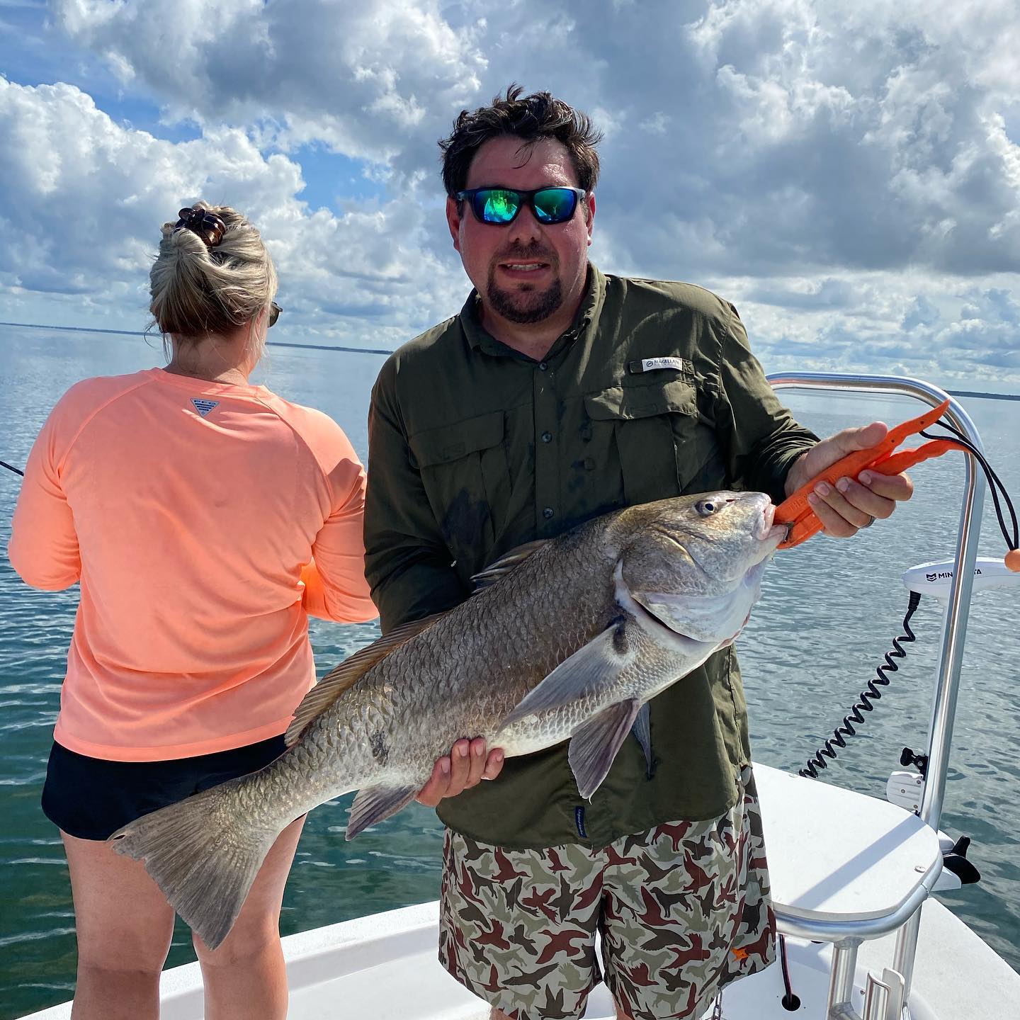 Angler with a big black drum fish caught in Port Saint Joe
