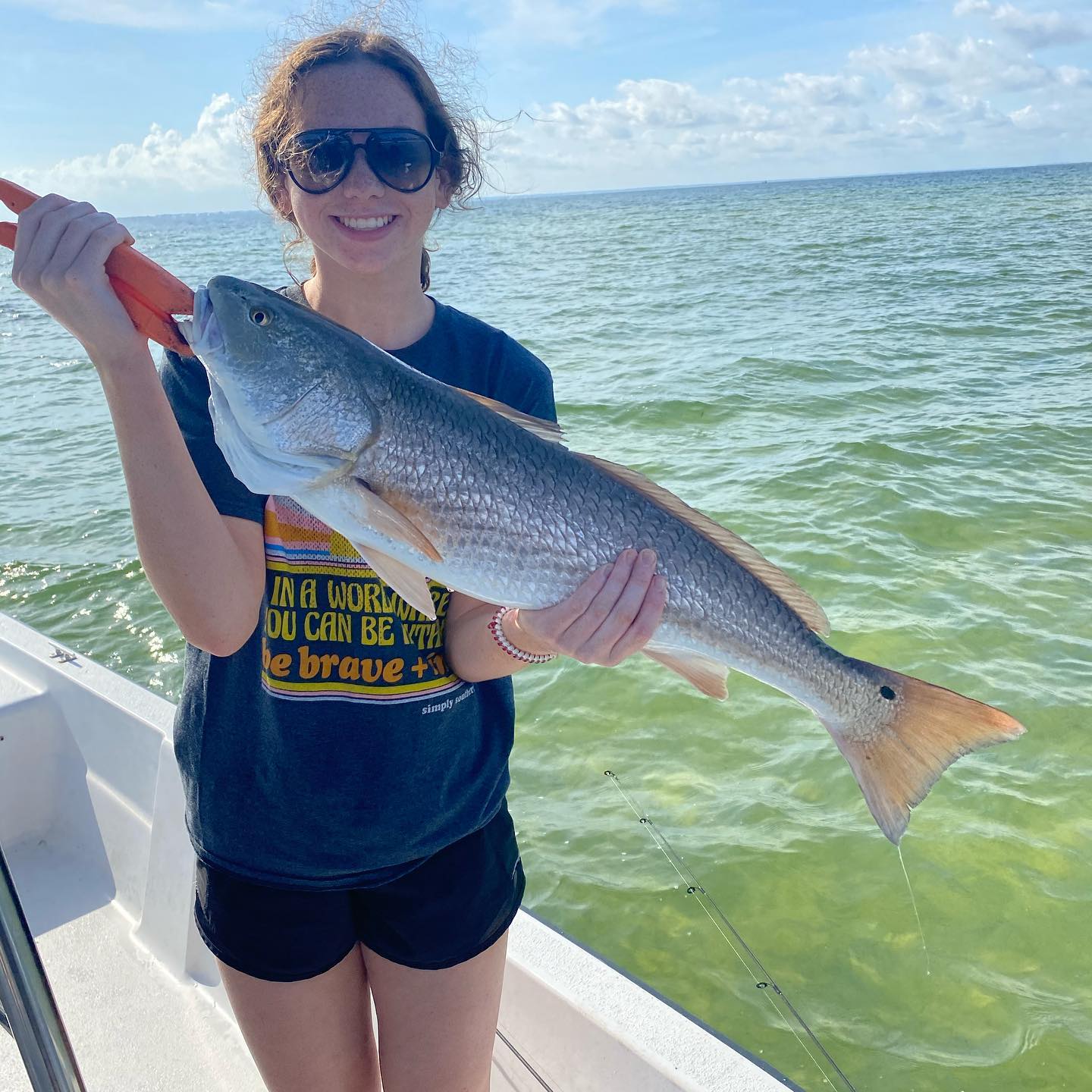 Angler with a 24-inch fish in FL