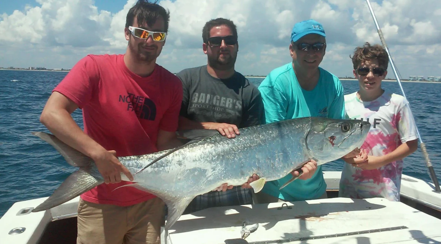 4 anglers with big 29-inch fish at Port Canaveral
