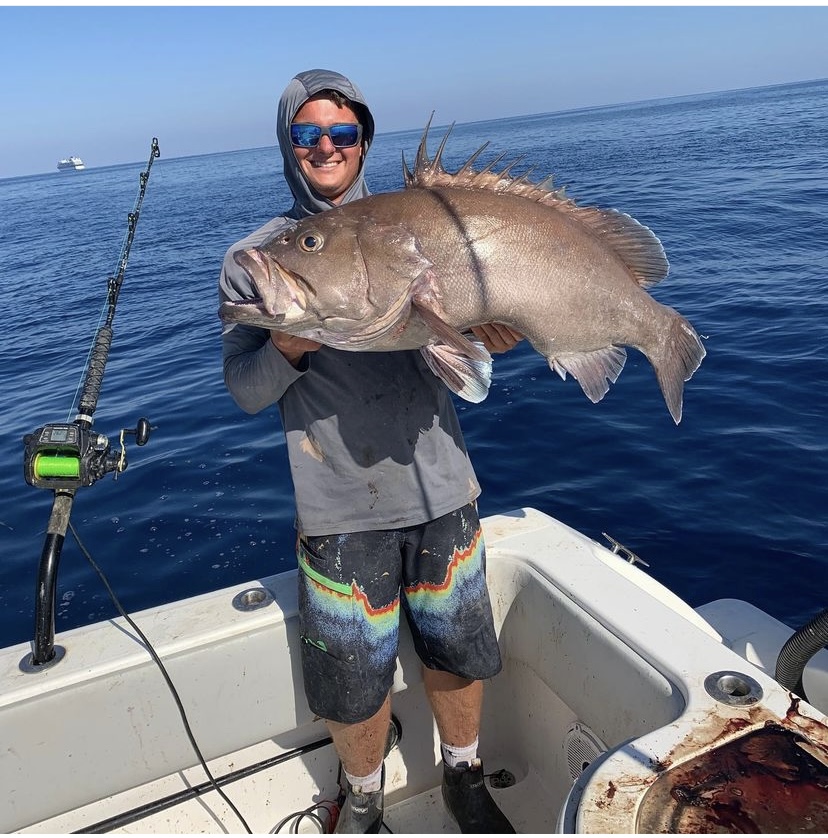 Red grouper caught while fishing on boat in ocean waters