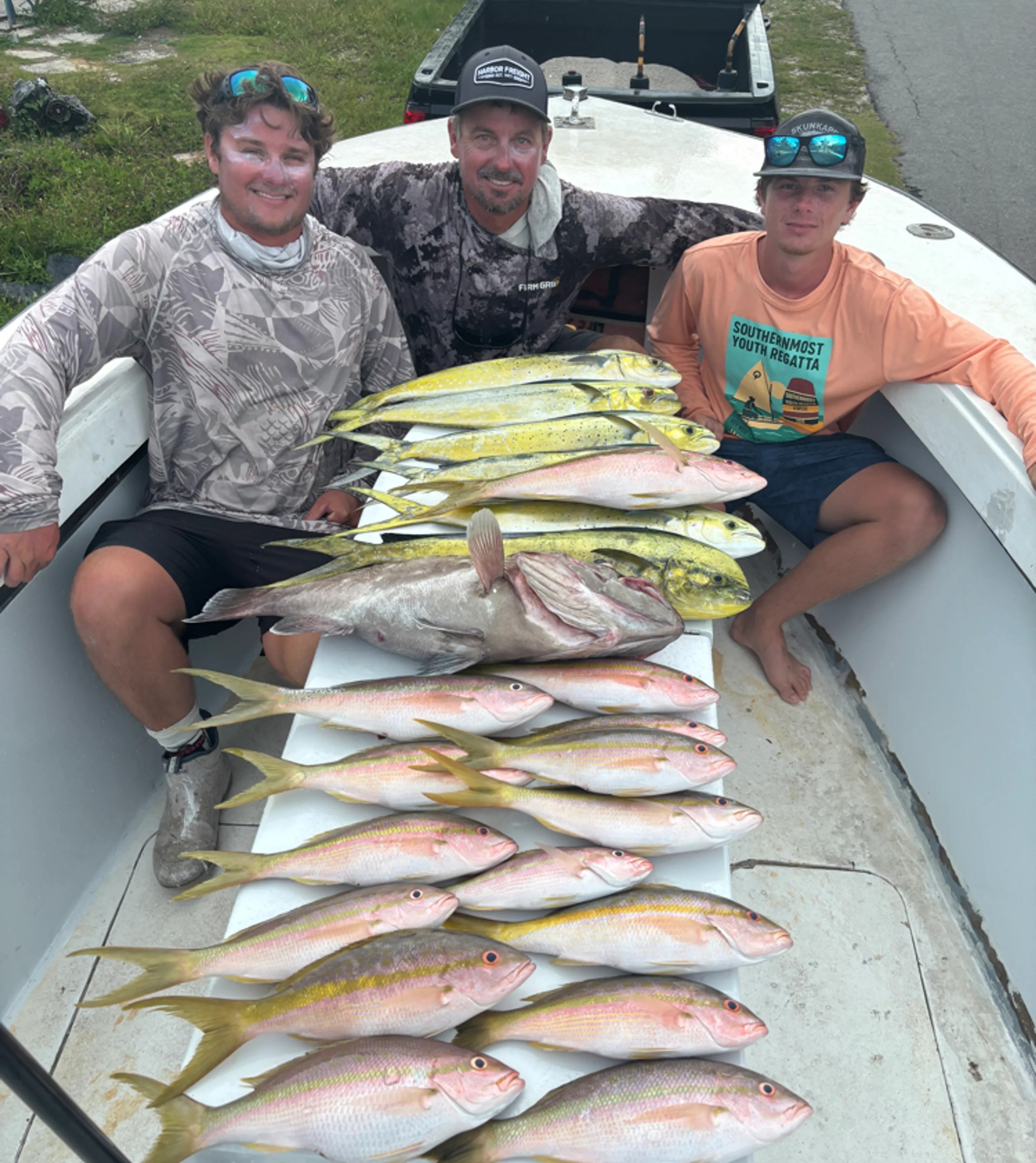Florida Keys 8-hour offshore fishing charter boat with anglers catching grouper and snapper