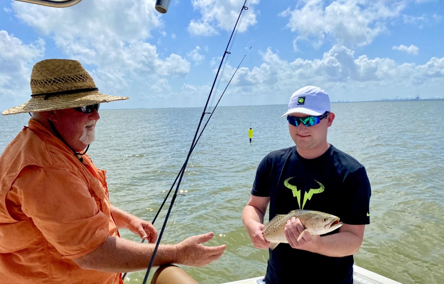 Two people fishing in Galveston