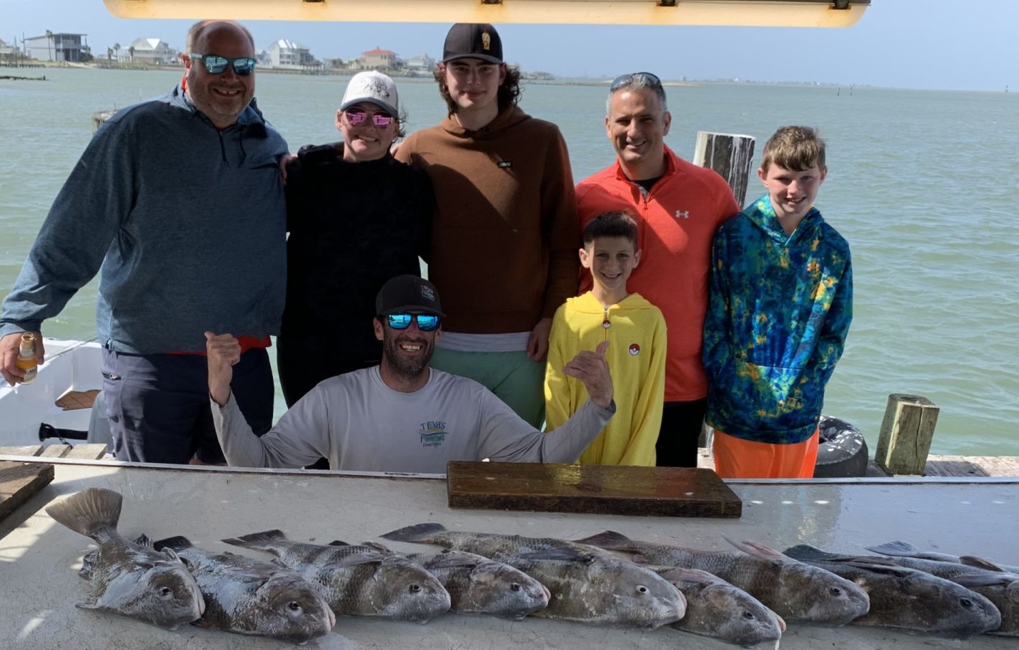 Seven people fishing in Galveston
