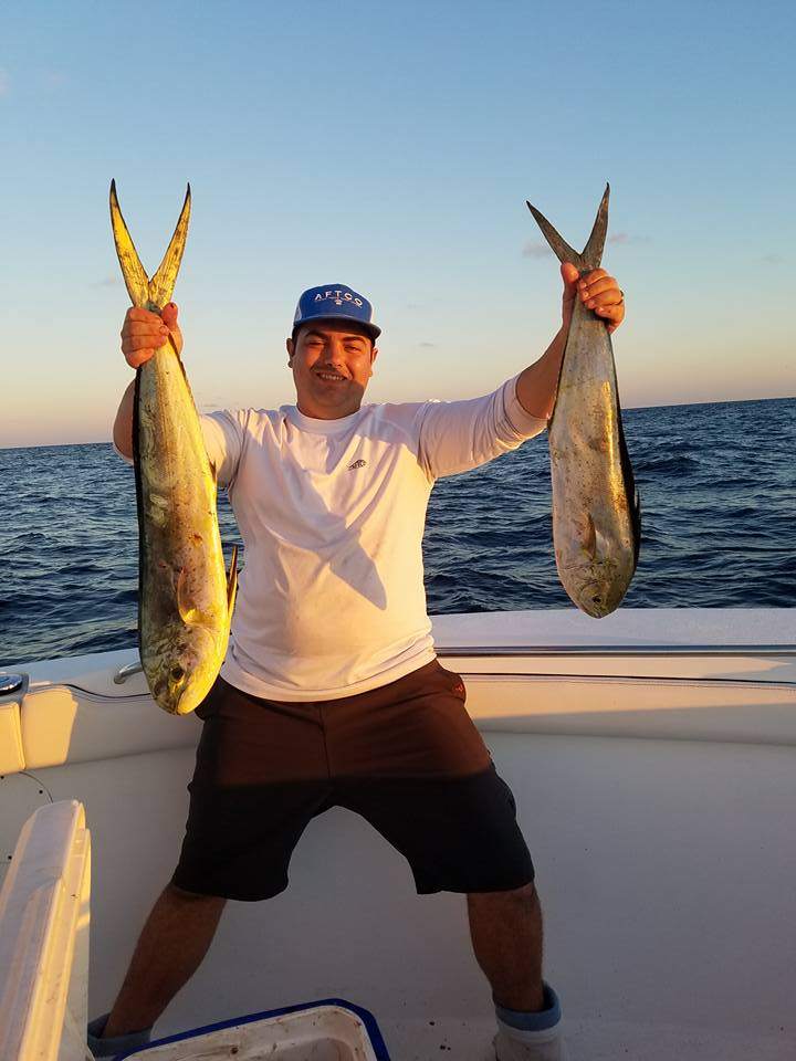 Angler fishing in Florida with 2 big fish