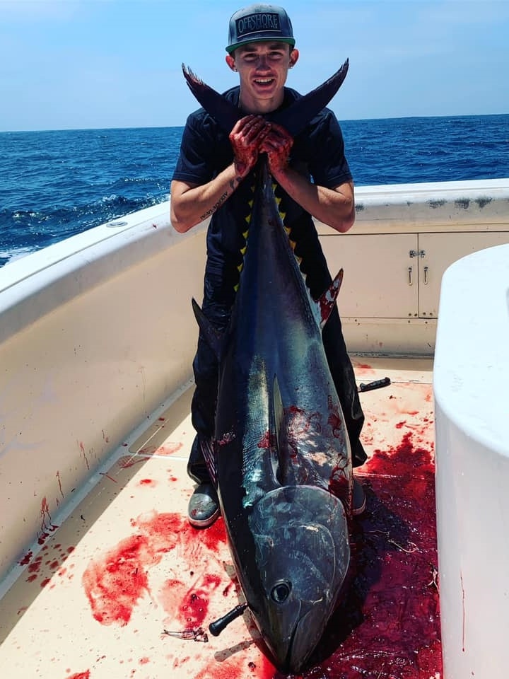 Angler catching a 42-inch fish in CA