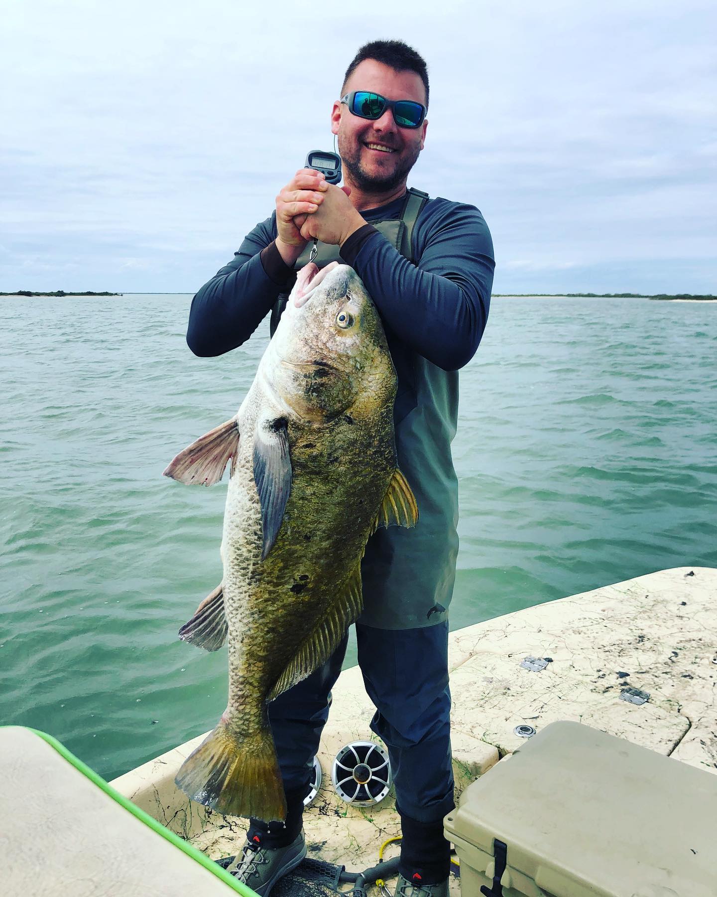 Anglers with a big 27-inch catch in TX