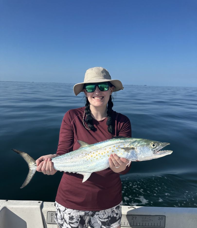 A person fishing for a cero mackerel in St. Petersburg